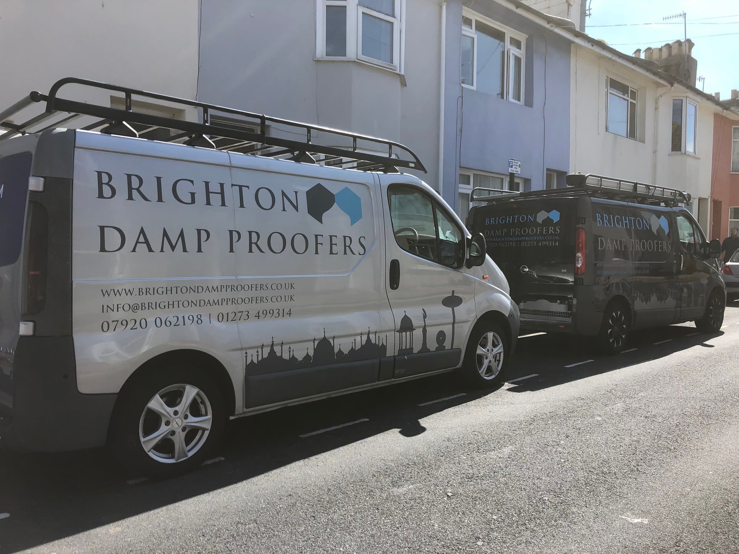Brighton Damp Proofers team vans on site